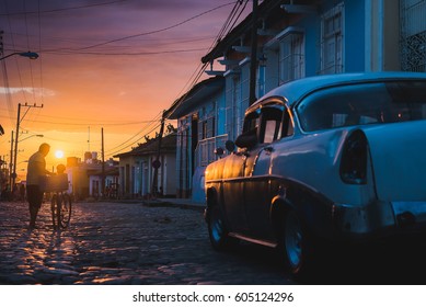 Cuban Street Sunset With Oldtimer In Trinidad, Cuba