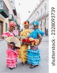 Cuban women called canasteras with habano flowers and typical costume in La Havana, Afro caribbean people in Latin America