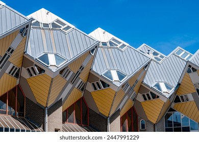 Cube houses or Kubuswoningen, modernist construction seen from lower angle, cube at 45° angle on hexagonal-shaped pillars, sunny day in city of Rotterdam, Zuid-Holland, Netherlands - Powered by Shutterstock