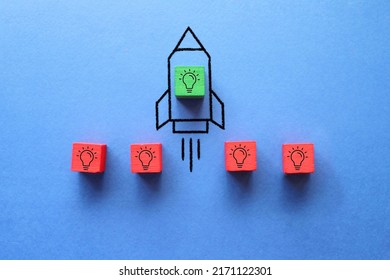 Cube with idea lightbulb took off on rocket. Developing startup, best idea. Business accelerator. - Shutterstock ID 2171122301