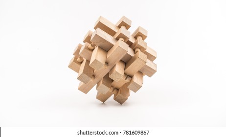 Cube puzzle wooden blocks isolated on white or empty background. Concept of complex solution. Slightly de-focused and close-up shot. Copy space.