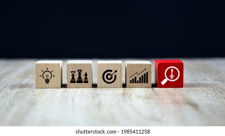 Cube Wooden Block Stack With The Key On Business Strategy Icon With Graph And Arrow Bullseye Of Strategic Plan And Marketing Organization Management For Success And Growth Concepts.