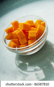 Cubed Butternut Squash Ingredient For Recipe On Blue Plate/Butternut Squash