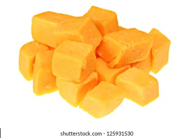 Cubes Of Cheddar Cheese Isolated On White