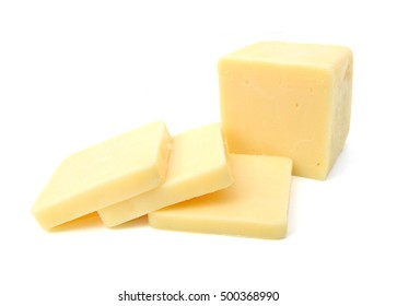 Cubes Of Cheddar Cheese Isolated On White 