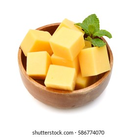 Cubes Of Cheddar Cheese Isolated In Wooden Bowl On White Background 