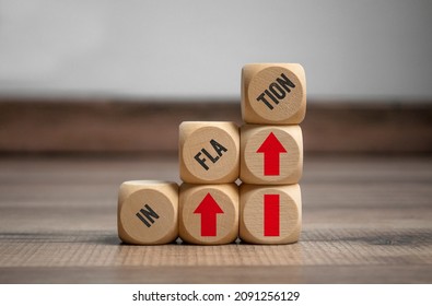 Cubes, dice or blocks with inflation on wooden background - Shutterstock ID 2091256129