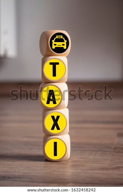 Cubes and dice with\
word taxi and taxi icon