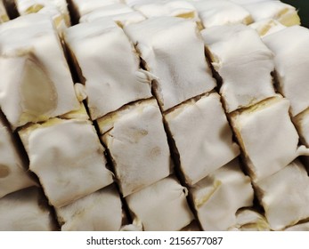 The Cubes Of Fermented Soybean Cake (tempe, The Indonesian Food Made Of Fermented Soybean). (macro Shot)