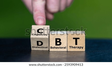 Cubes form the acronym CBT (Cognitive Behavioral Therapy) and DBT (Dialectical Behavior Therapy). 