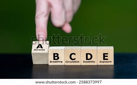 Cubes form the expression ABCDE. Symbol for the medical ABCDE (Airway, Breathing, Circulation, Disability, Exposure) approach.