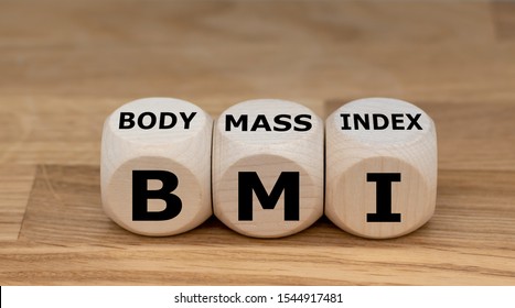 Cubes form the expression "BMI" (Body Mass Index)