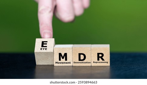 Cubes form the Expression EMDR, which stands for Eye Movement Desensitization and Reprocessing. EMDR is a psychotherapy treatment that is designed to alleviate the distress with traumatic memories.