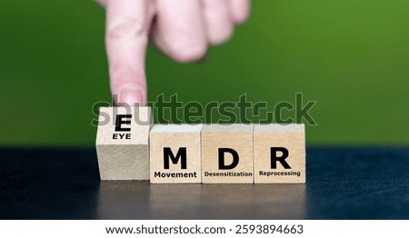 Cubes form the Expression EMDR, which stands for Eye Movement Desensitization and Reprocessing. EMDR is a psychotherapy treatment that is designed to alleviate the distress with traumatic memories.