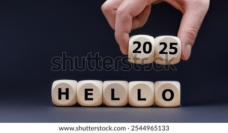 Cubes form the expression 'Hello 2025'.