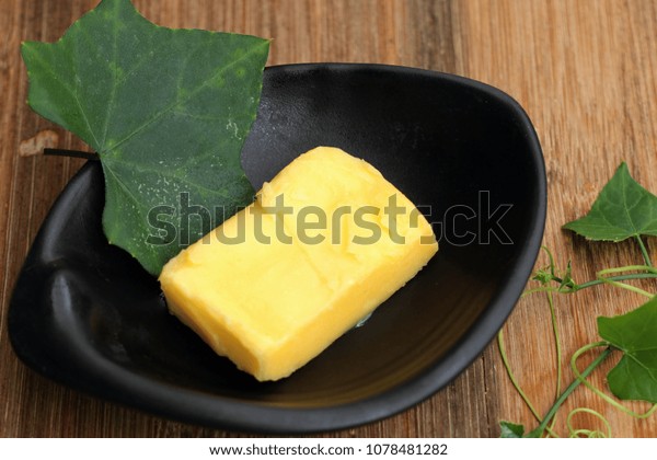 Download Cubes Melted Yellow Butter Stock Photo Edit Now 1078481282 PSD Mockup Templates