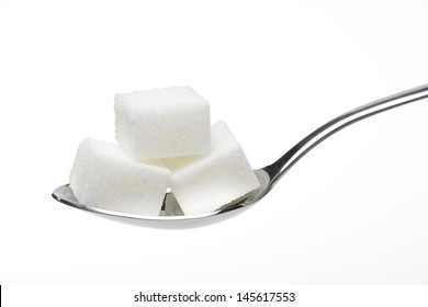 Cubes Of Sugar On A Spoon