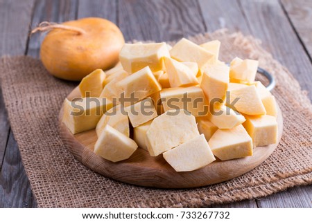 Cubes turnips on a chopping board