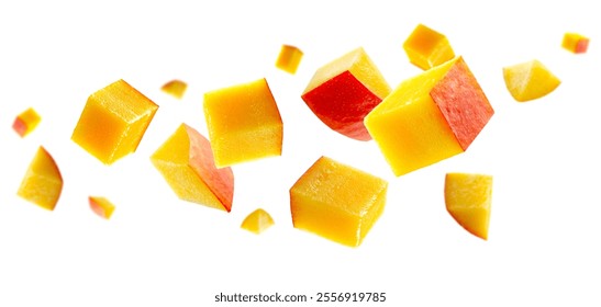 Cubic and triangular mango pieces form an unusual figure in space. Isolated on white