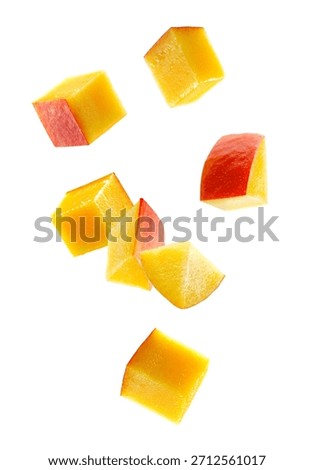 Cubic and triangular mango pieces form an unusual figure look like a loop. Isolated on white
