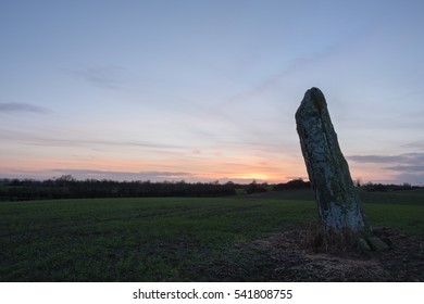 cuchulainn-standing-stone-sunset-co-260nw-541808755.jpg