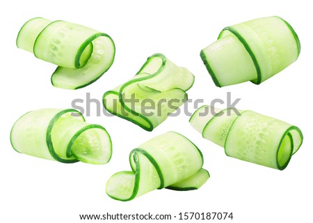 Cucumber curls, rolled up slices or shavings, isolated