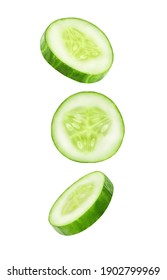 Cucumber slices falling, hanging, flying, soaring isolated on a white background with clipping path. Full depth of field. - Shutterstock ID 1902799969