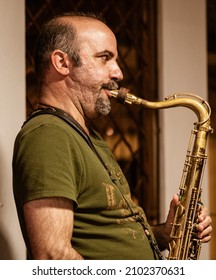 Cuenca, Ecuador, Dec 4, 2021 - Man Plays Saxaphone