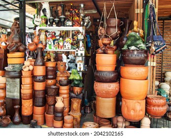 Cuenca, Ecuador - July 24, 2021: Clay Plant Pots And For Cooking Pots, Jars Along With Different Souvenirs Found At The Artisan Market In Cuenca