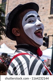 Cuenca, Ecuador / November 3, 2015 -A Mime Clown Entertains The Crowd During The Independence Day Parade