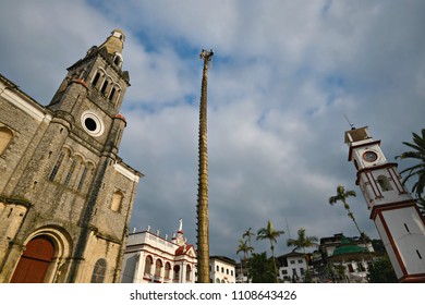 Cuetzalan Del Progreso, Puebla Mexico. May 23, 2018. Flying Dancers On The Top Of The Tree Pole Front Of The Church Parroquia De San Francisco De Asís Getting Ready For The Dance Of The Flyers Ritual.