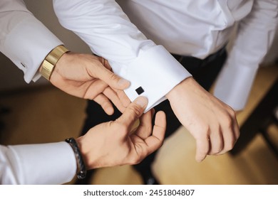 Cufflinks wearing background. Dressing up the groom. Wedding preparation background. White shirt for business meeting. Elegance and stylish fashion background. - Powered by Shutterstock