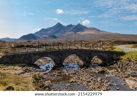 Cuillin mountains behind old stone bridge, Isle of Skye. Scotland