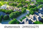 Cul-de-sac dead-end street in wealthy suburban neighborhood with large mansion houses in lush greenery forested area, green cityscape in suburbs Dallas Fort Worth metroplex, parkside, aerial view. USA