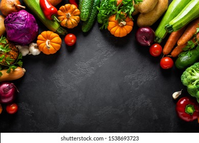 Culinary Background With Fresh Raw Vegetables On A Black Kitchen Table, Healthy Vegetarian Food Concept, Flat Lay Composition, Top View