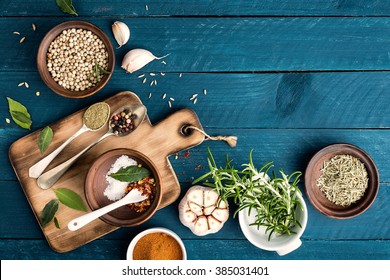 Culinary Background With Spices On Wooden Table