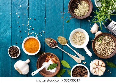 Culinary Background With Spices On Wooden Table