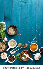 Culinary Background With Spices On Wooden Table