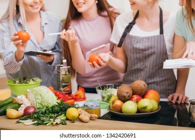 Culinary Courses. Communication And Food Education. Women Choosing Organic Vegetables And Learning Healthy Diet Recipes.