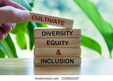 Cultivate Diversity, Equity And Inclusion Text On Wooden Blocks. Togetherness Concept