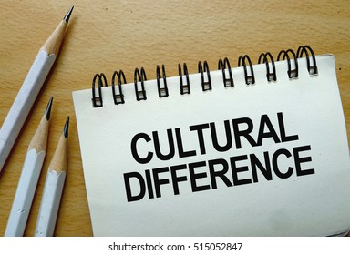 Cultural Difference Text Written On A Notebook With Pencils