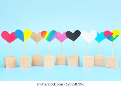 Cultural, Racial, Gender, Age And General Equality, Inclusion, Love And Diversity Concept. Multicolored Heart Shape Icons In Blue Background.	