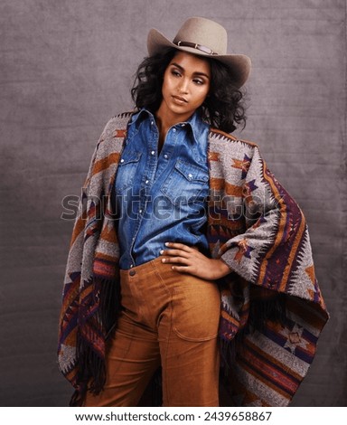 Culture, cowgirl or woman thinking in studio, wild west and cool fashion or clothing on grey background. Native American person, western lady and stylish model with pride, boho style and confidence