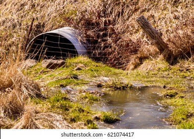 Culvert At Roadside Swampy Area