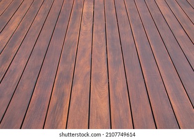 Cumaru wood decking texture and grains background, cumaru deck exotic hardwood close up - Shutterstock ID 2107749614