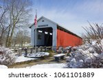 Cumberland Covered Bridge after a beautiful spring snow on an April morning in Grant County, Indiana