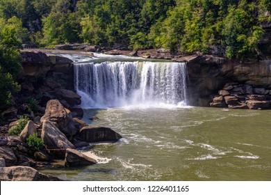 Cumberland Falls In Kentucky. Beautiful Cumberland Falls is one of the the largest waterfalls east of the Mississippi and is the centerpiece of Cumberland Falls State Park in Corbin, Kentucky.