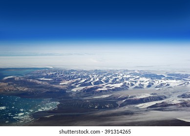 Cumberland Peninsula Mountains, Nunavut, Canada - aerial view from 12000 meters