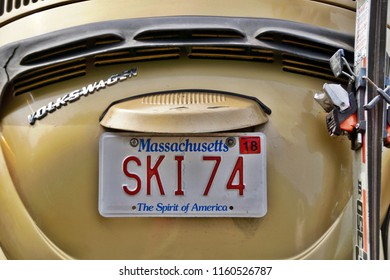 Cumberland, RI/USA- August 19, 2018: A Horizontal Image Of A Vanity Plate And Pair Of Skis On The Rear Of A Vintage VW Beetle At An Annual Summer Car Show.                               