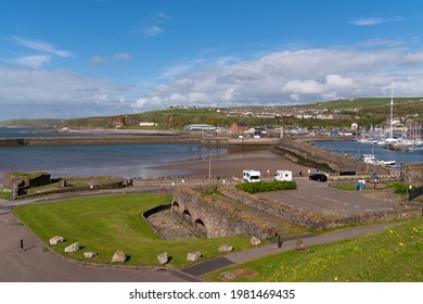 Cumbria Coast Town Whitehaven UK With Harbour Wall With Boats Near The Lake District